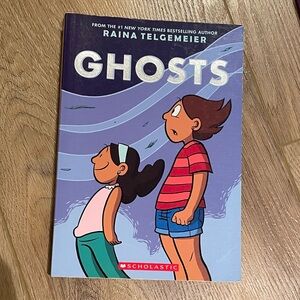 Scholastic Ghosts Graphic Novel with Blue and Red Cover